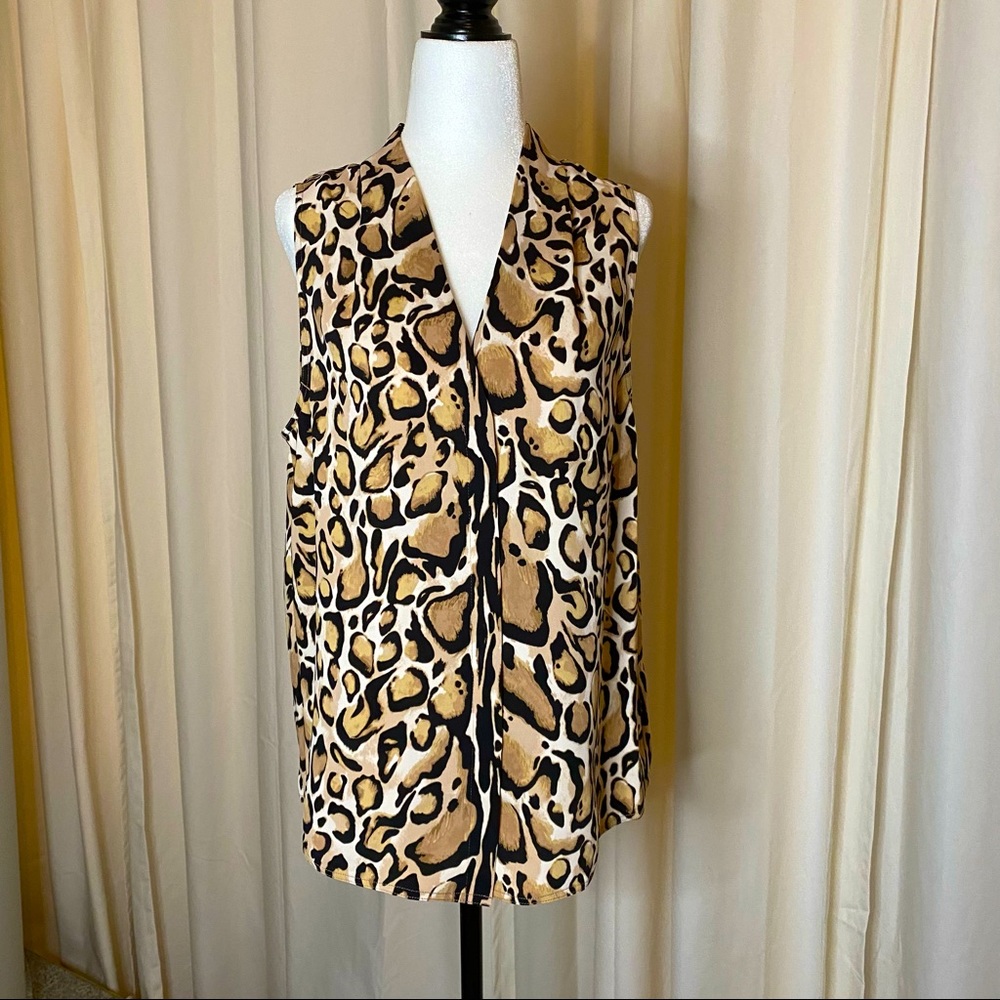 Babaton sleeveless blouse size M